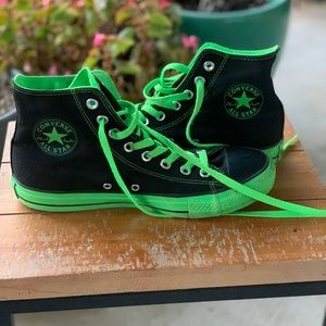 Black with neon green detail High Tops Converse.